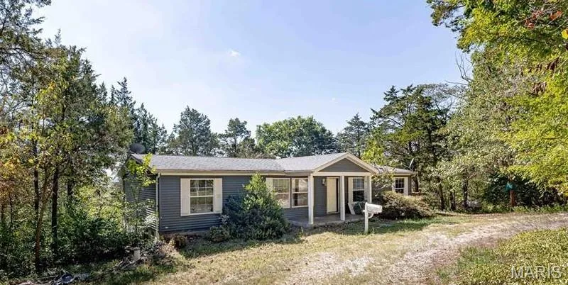 Single story home with a patio
