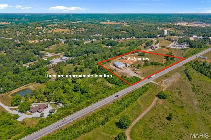 Aerial view of property's location featuring property parcel outlined