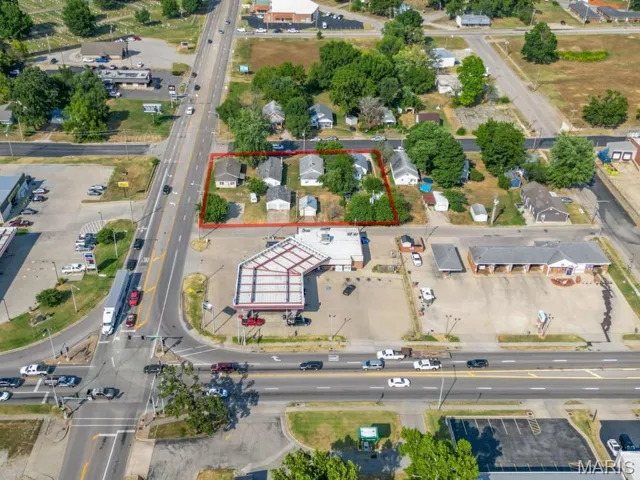 Aerial overview of property's location featuring property boundaries highlighted