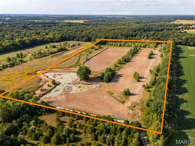 Overview of rural landscape featuring property boundaries highlighted