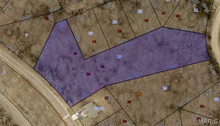 Aerial overview of property's location with property parcel outlined