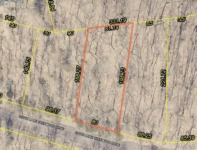 Aerial view of property's location with property parcel outlined