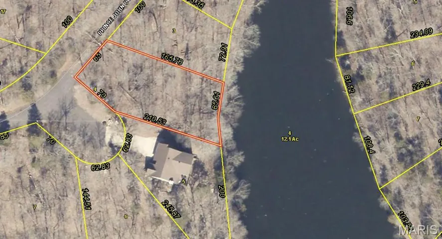 Aerial map of property and surrounding area featuring property parcel outlined