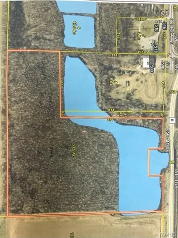Aerial map of property and surrounding area featuring property parcel outlined