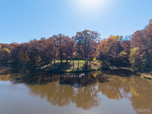 View from the other side of the lake looking back at the house