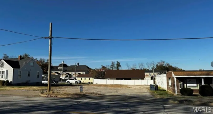 View of asphalt street with a residential view