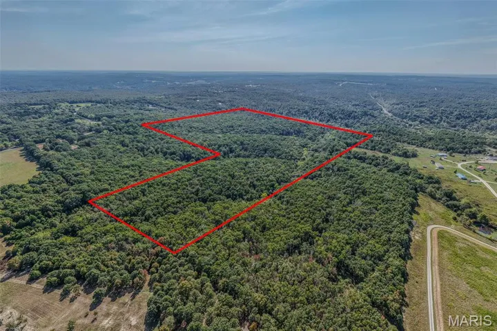Aerial overview of property's location with property boundaries highlighted