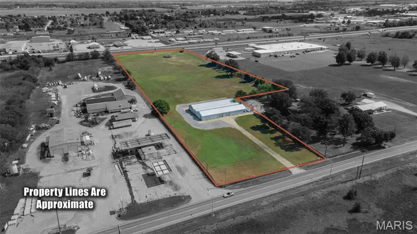 Aerial view of property's location with property parcel outlined