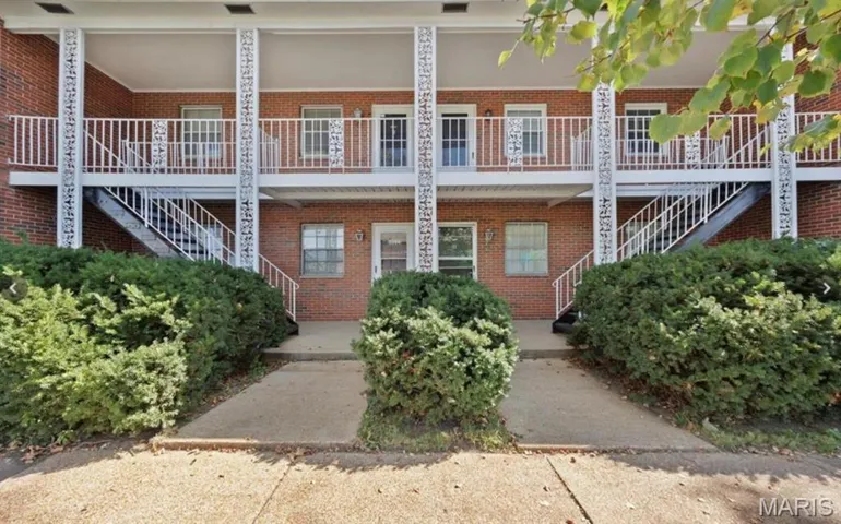 View of building exterior with stairway
