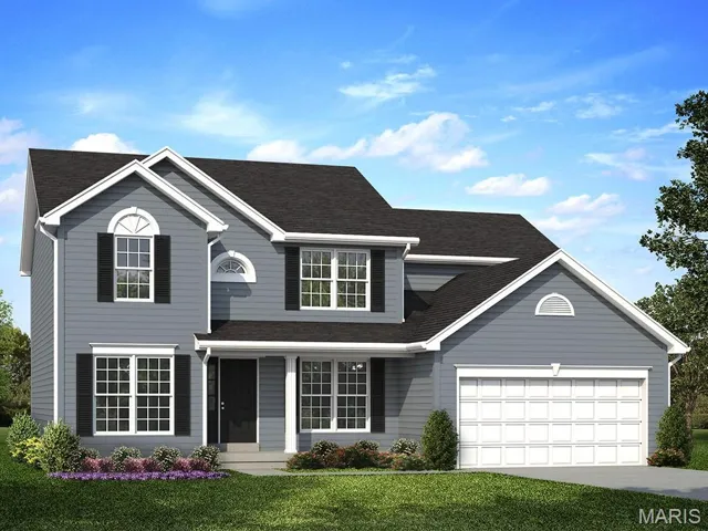 Traditional home with a front yard, driveway, and a shingled roof