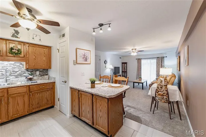 View from kitchen into living room with peninsula