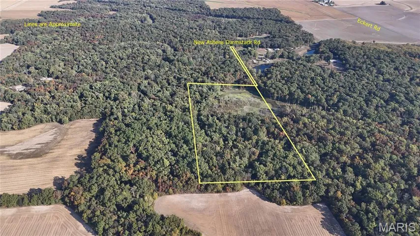 Aerial view of property and surrounding area featuring property boundaries highlighted