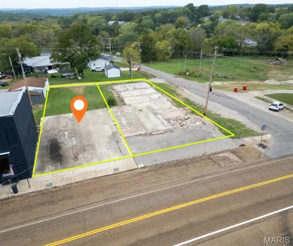 Aerial view of property's location featuring property boundaries highlighted