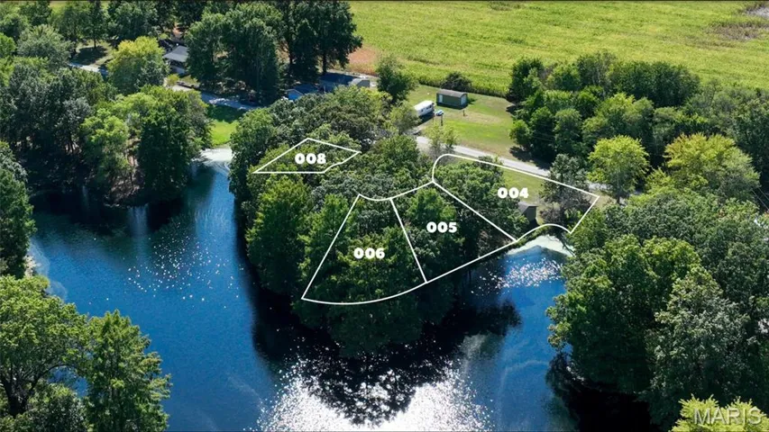 Aerial view of property and surrounding area with property boundaries highlighted