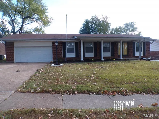 Ranch-style house featuring covered porch, a front lawn, concrete driveway, brick siding, and an attached garage