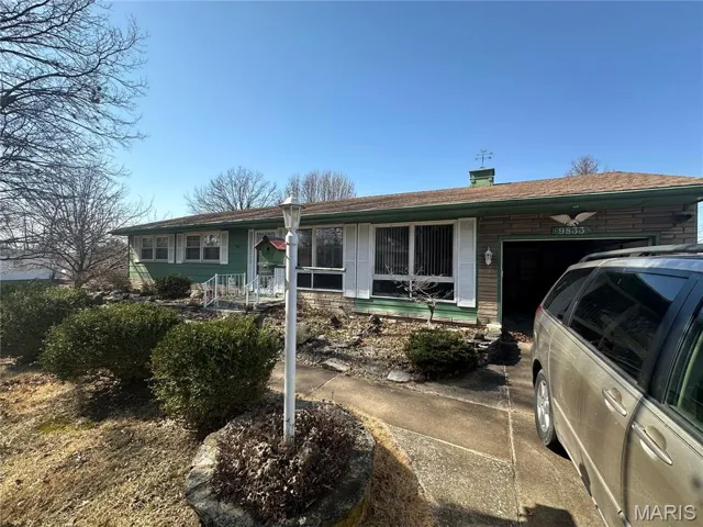Single story home with an attached garage
