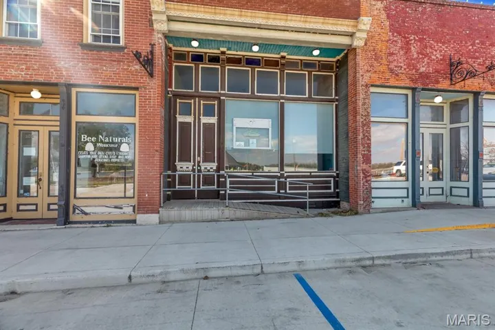 View of the front of the building with ramp leading to front door