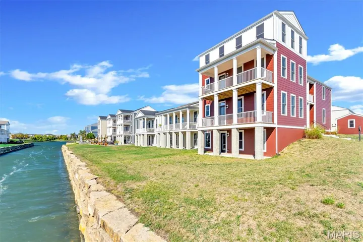 View of building exterior featuring a water view