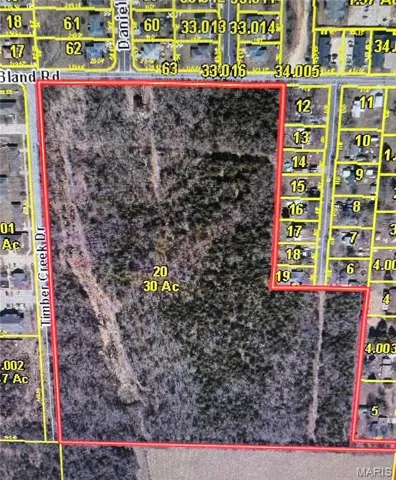 Aerial view of property's location featuring property parcel outlined
