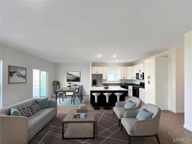 Open floor plan with plenty of natural light and high ceilings (9' throughout the home)