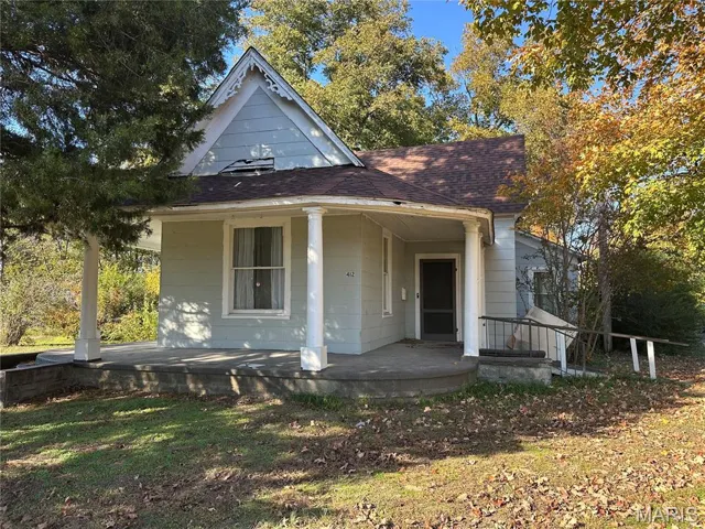 Front with wrap around porch
