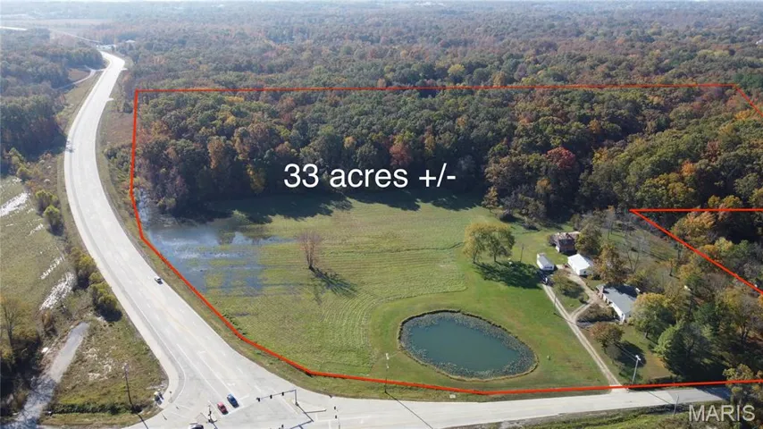 Aerial view of property's location featuring property parcel outlined