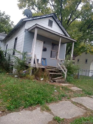 View of front of property with a porch