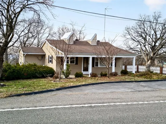 View of front facade featuring covered porch
