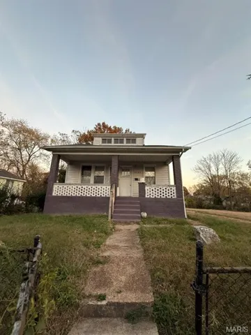 View of front of house featuring covered porch