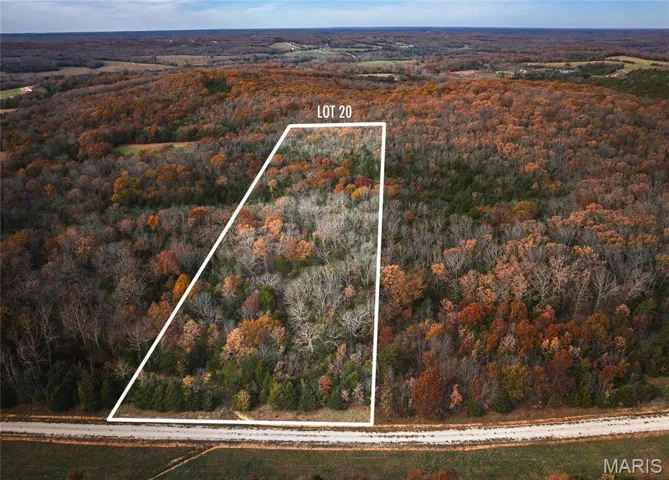 Aerial view of property and surrounding area with property boundaries highlighted