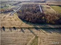 Overview of rural landscape featuring extensive farmland