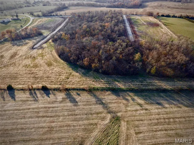 Aerial view of property's location featuring rural landscape