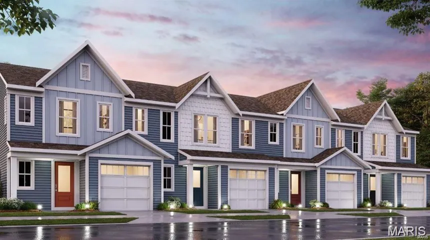 View of front of home with board and batten siding, an attached garage, roof with shingles, and driveway