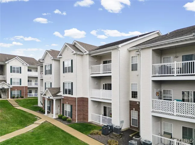 View of building exterior featuring a residential view