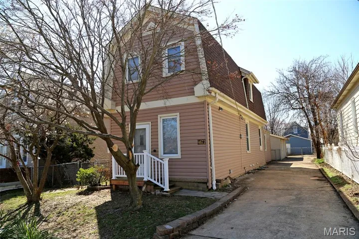 View of front of home featuring a garage