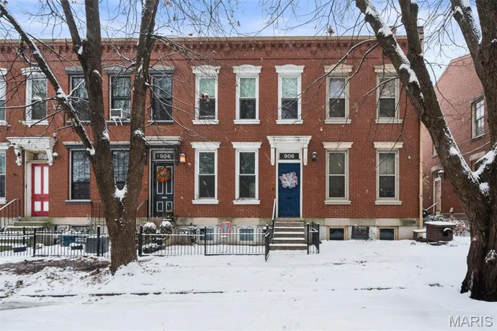 View of front of house featuring brick siding