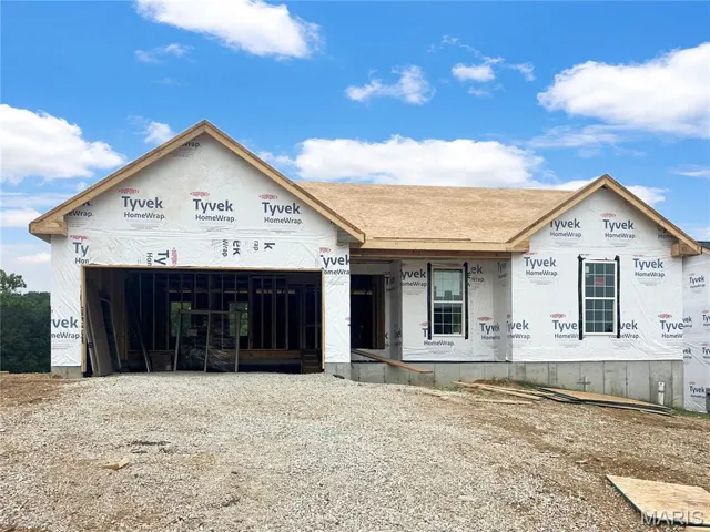 Front view of Pensford with 2 car garage --