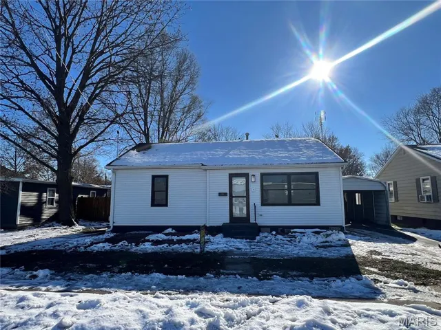 View of front facade featuring entry steps