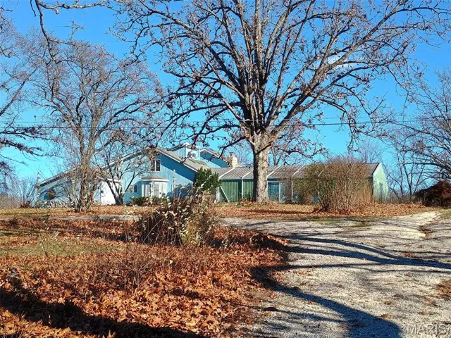 View of front of property with driveway