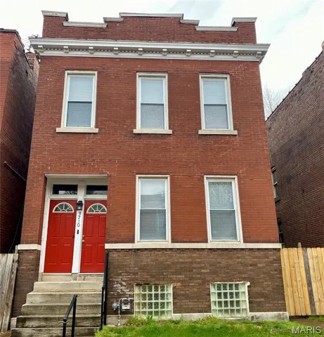 View of front of home with brick siding