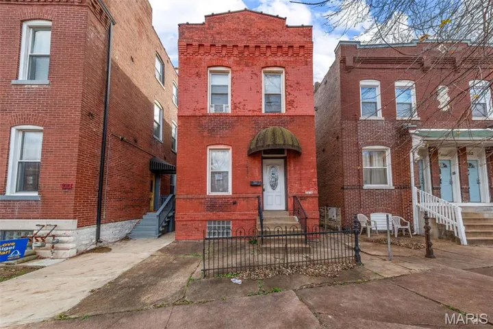 View of front facade with brick siding