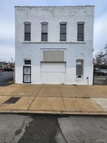 View of front of property featuring brick siding