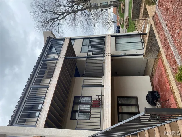 View of building exterior with stairs