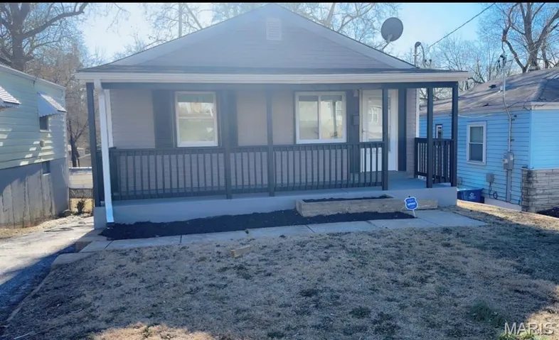View of front of house featuring covered porch