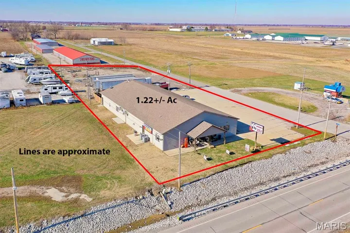 Aerial overview of property's location featuring property boundaries highlighted