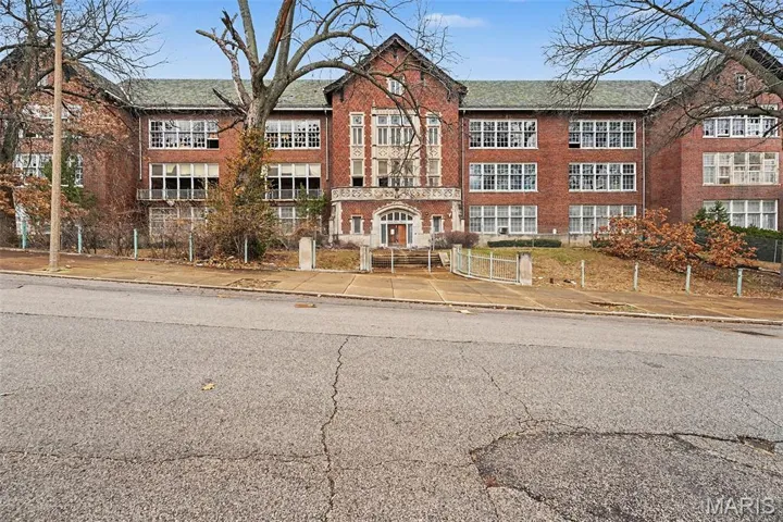 View of front of home with brick siding