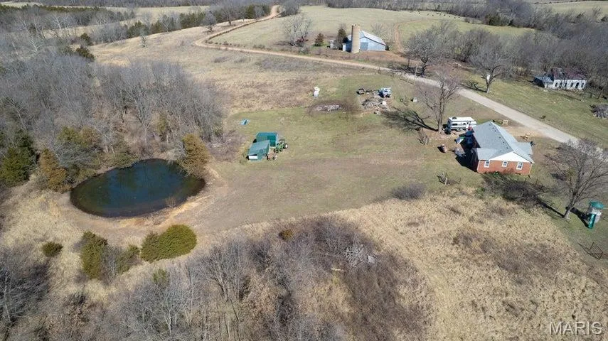 View of property location featuring rural landscape and a nearby body of water
