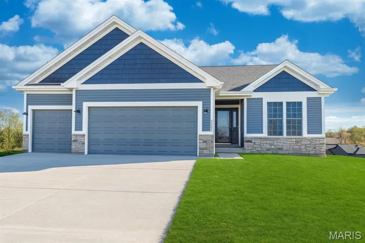 Halifax II with 3 car garage by Northern Star Homes