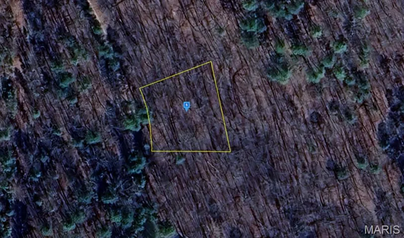 Aerial overview of property's location with property parcel outlined