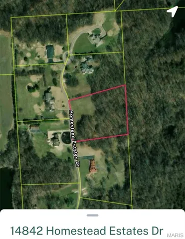 Aerial map of property and surrounding area featuring property parcel outlined